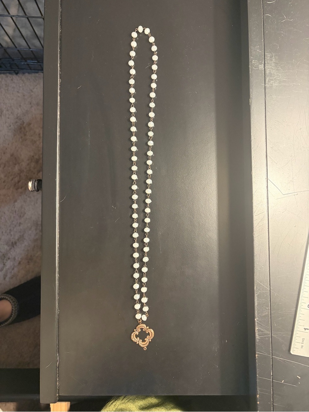 Elegant White Beaded Necklace with Gold Pendant